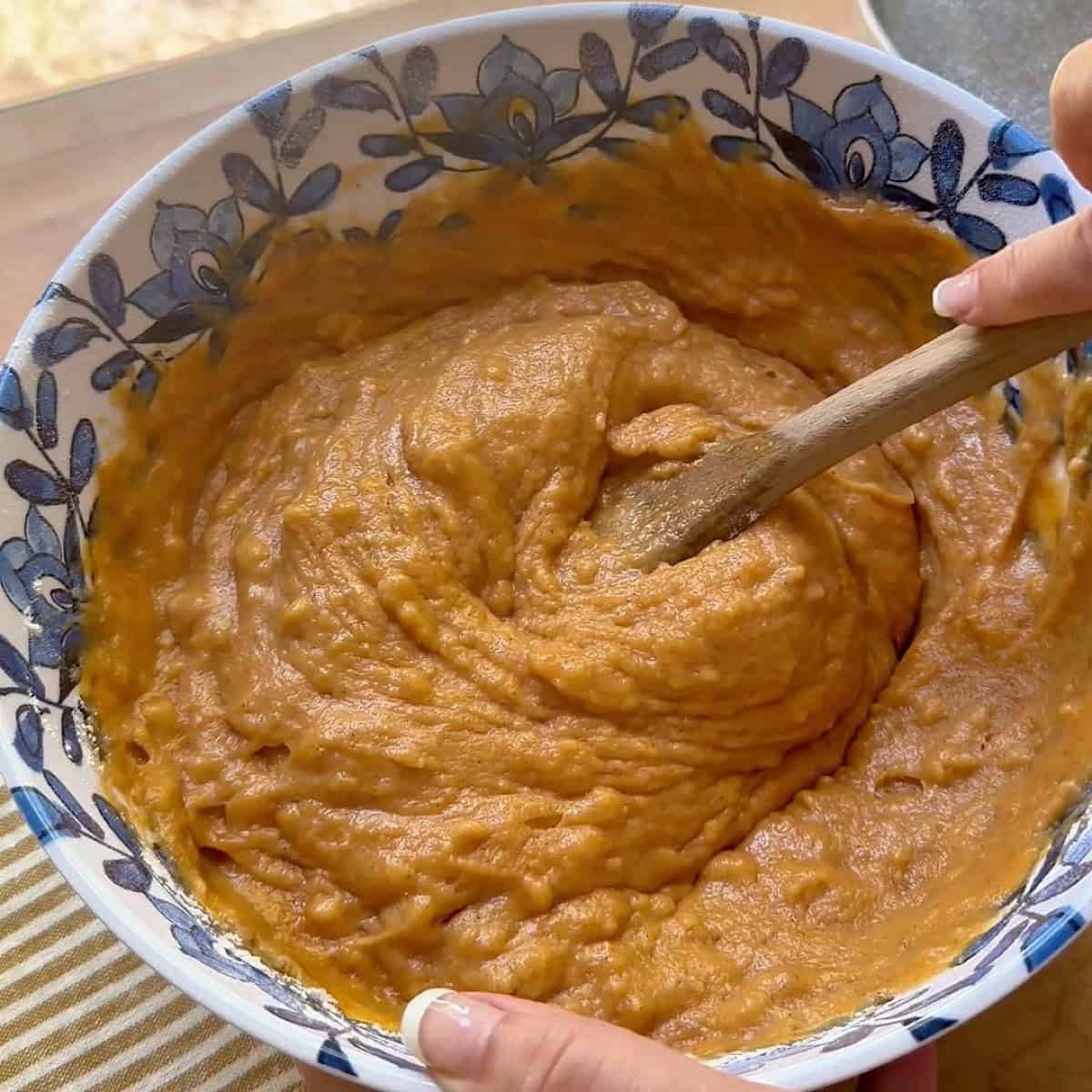 Wet and dry ingredients combined in a bowl.