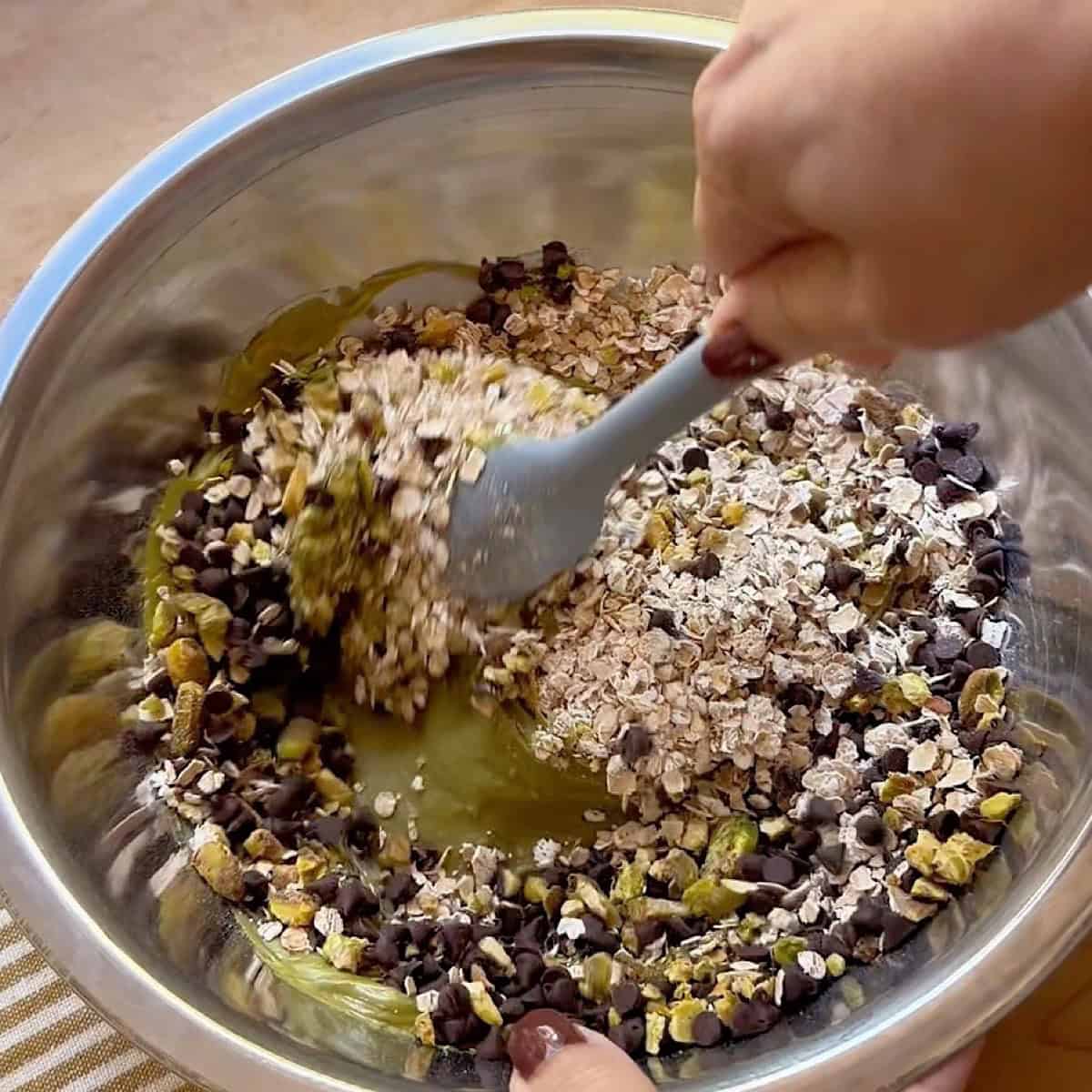 Folding in the dry ingredients.