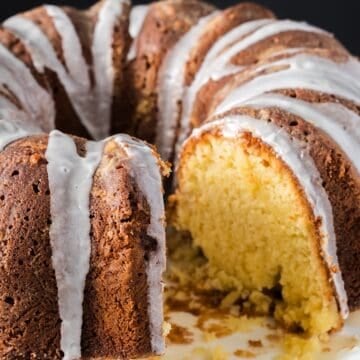 Southern pound cake with a slice removed to show moist crumb.