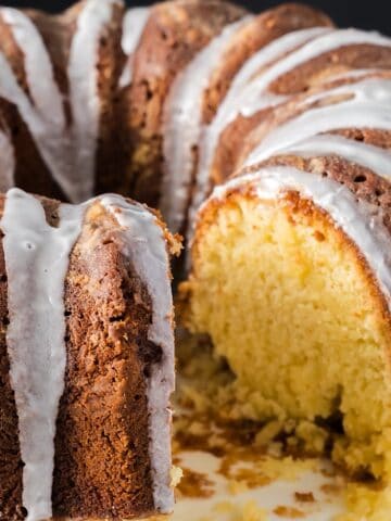 Southern pound cake with a slice removed to show moist crumb.