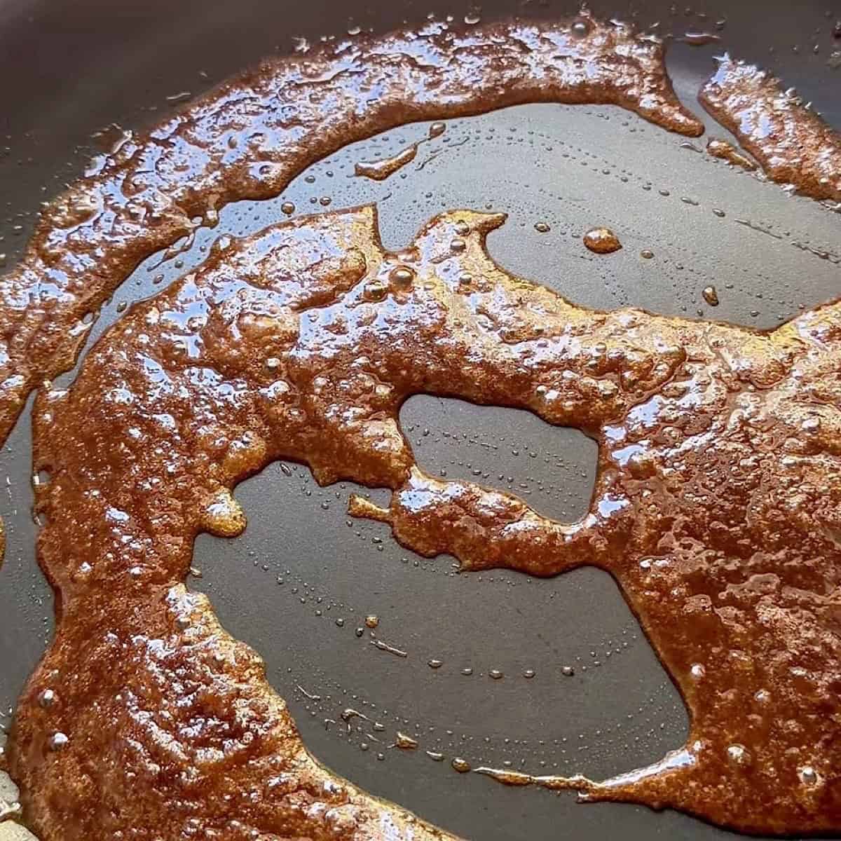 Butter, brown sugar, and cinnamon heated until smooth and bubbly.