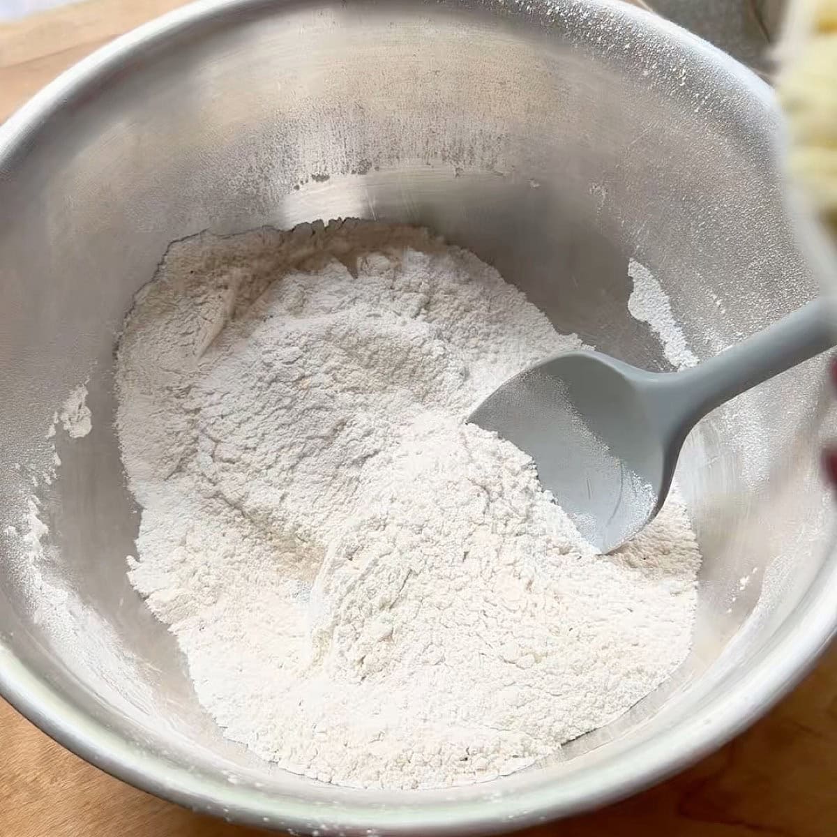 Dry base sifted into a mixing bowl.