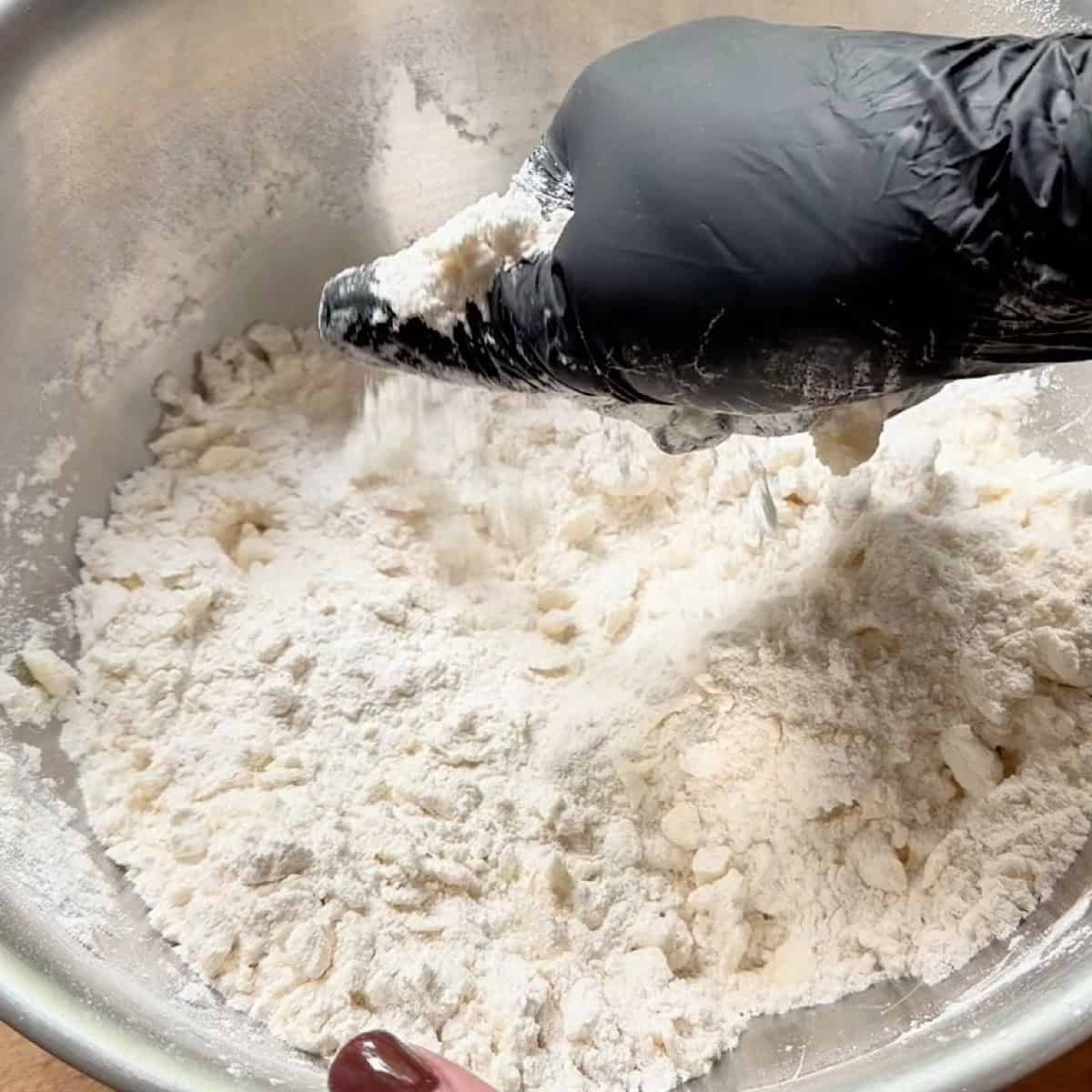 Cold butter cut into the flour making little pebbles.