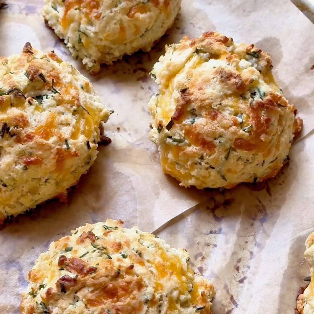 Drop biscuits scooped on to parchment paper ready to bake.