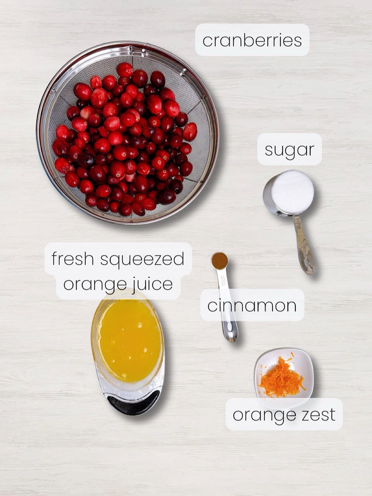 A labeled image of everything needed to make cranberry compote.