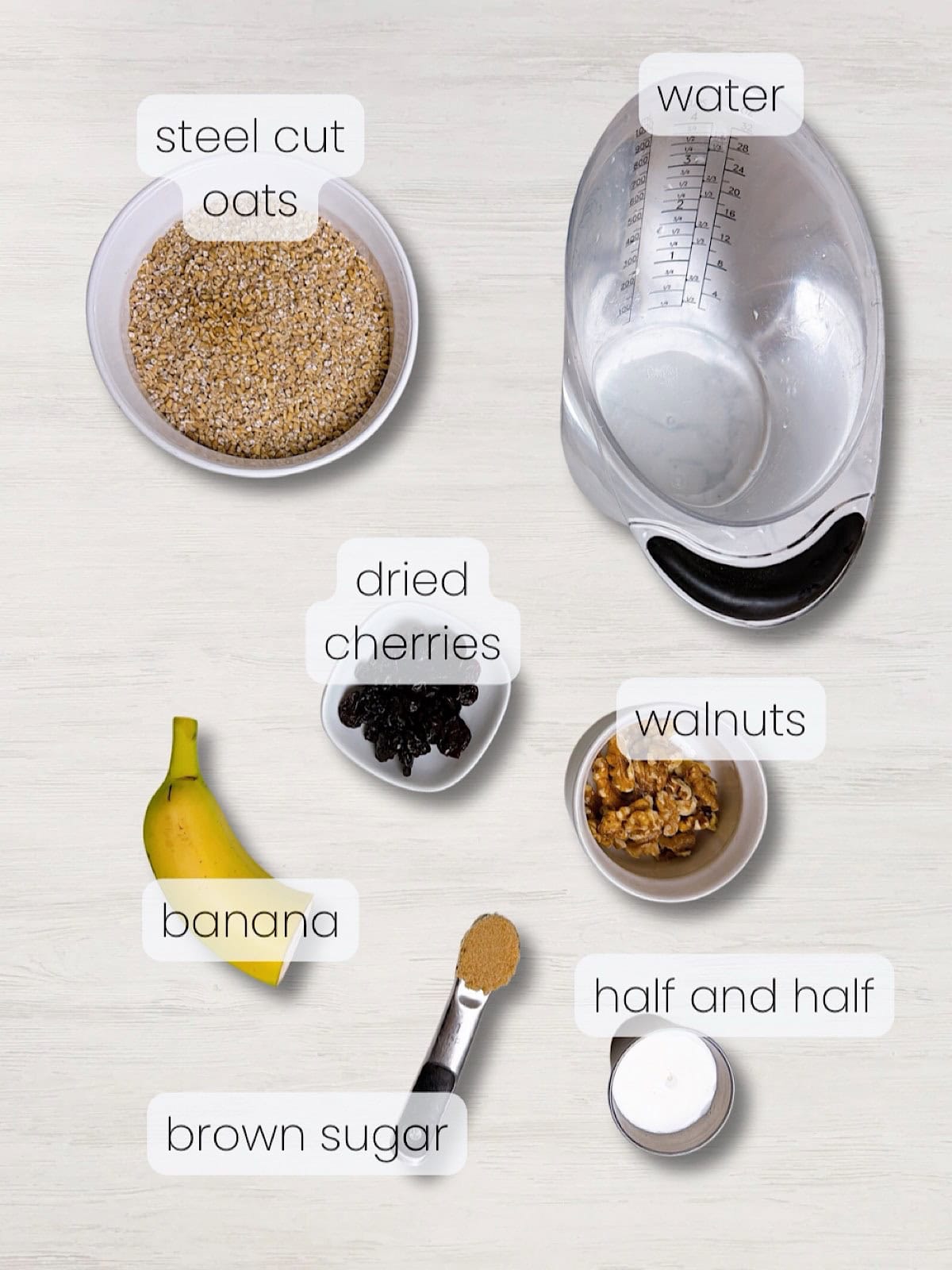 A labeled image of everything needed to make creamy instant pot steel cut oats with fruit and nuts.