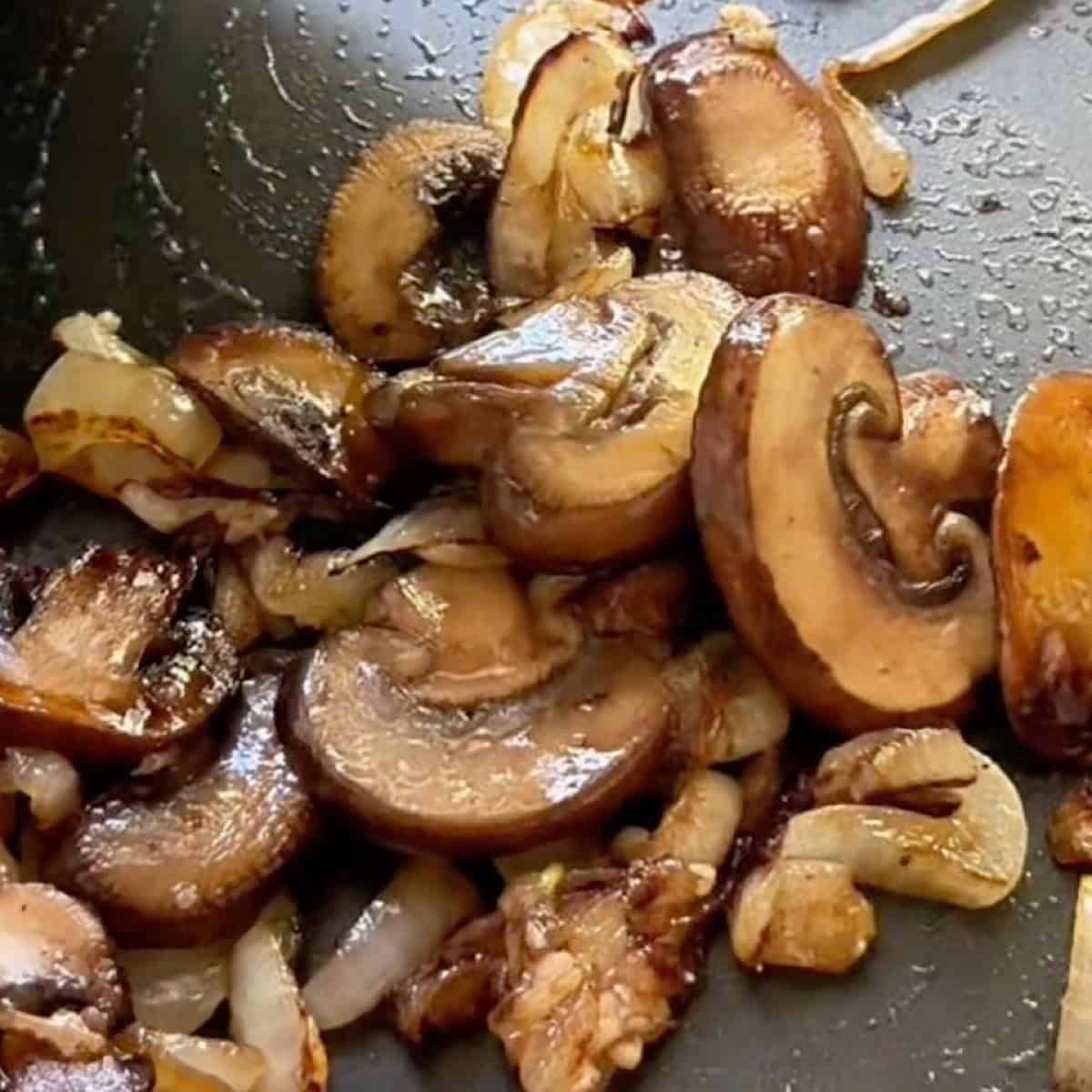 Browned mushrooms combined with onions and garlic.