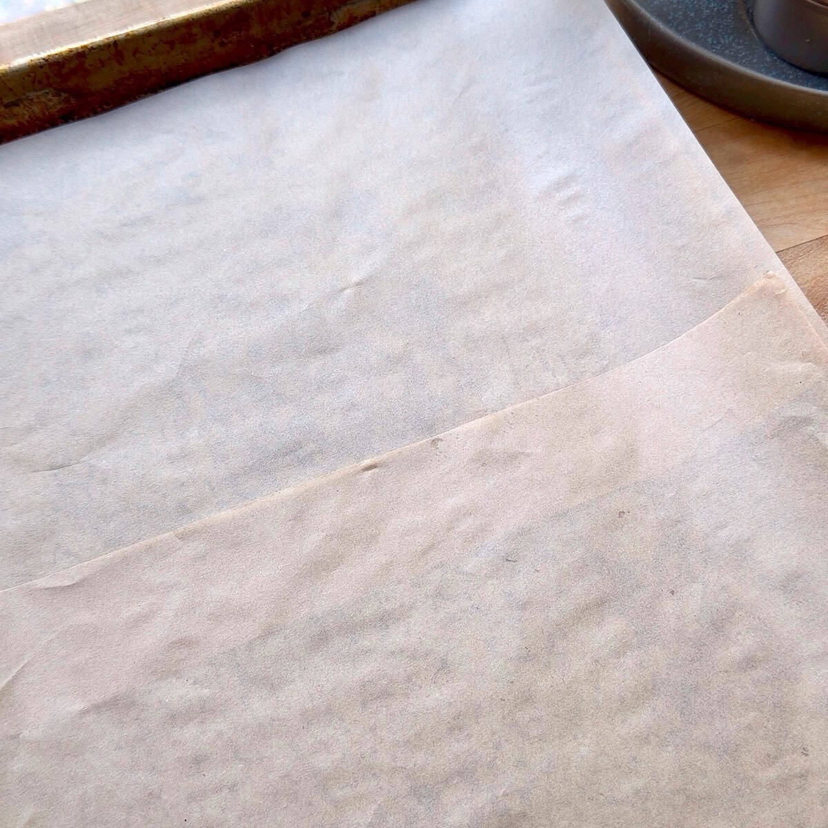A large sheet pan lined with parchment paper.