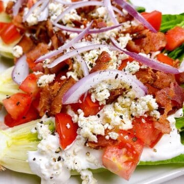 Blue cheese wedges with all the toppings on a platter.