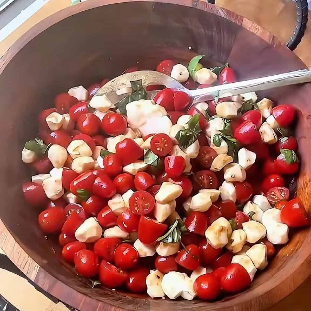 Caprese salad tossed and ready to serve.