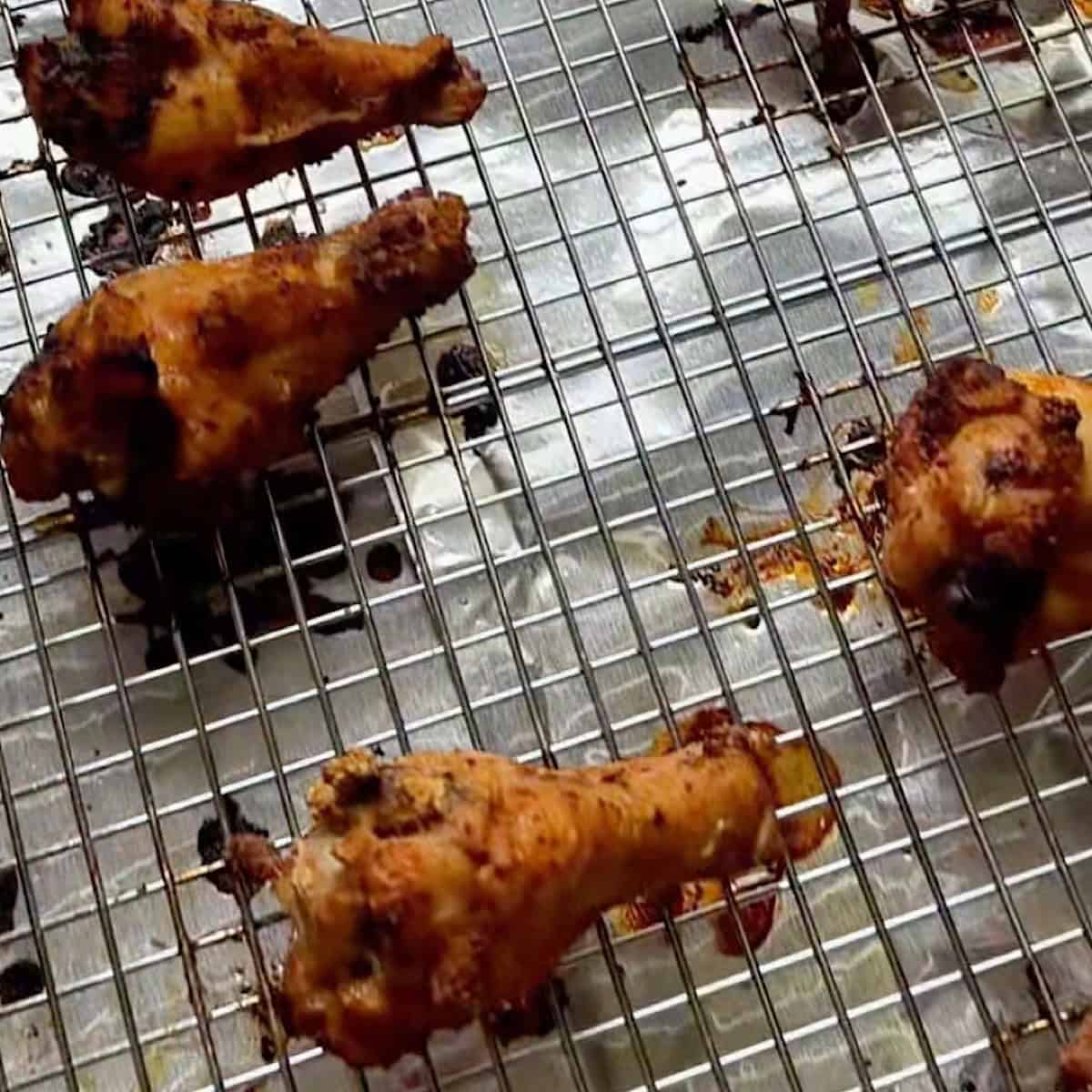 Crispy baked chicken wings removed from the oven.