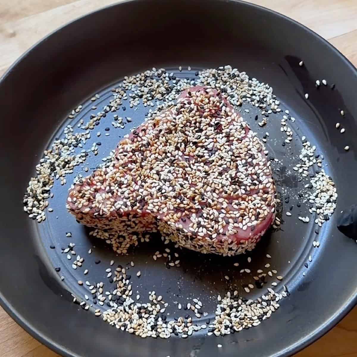 Ahi tuna coated with sesame seeds.