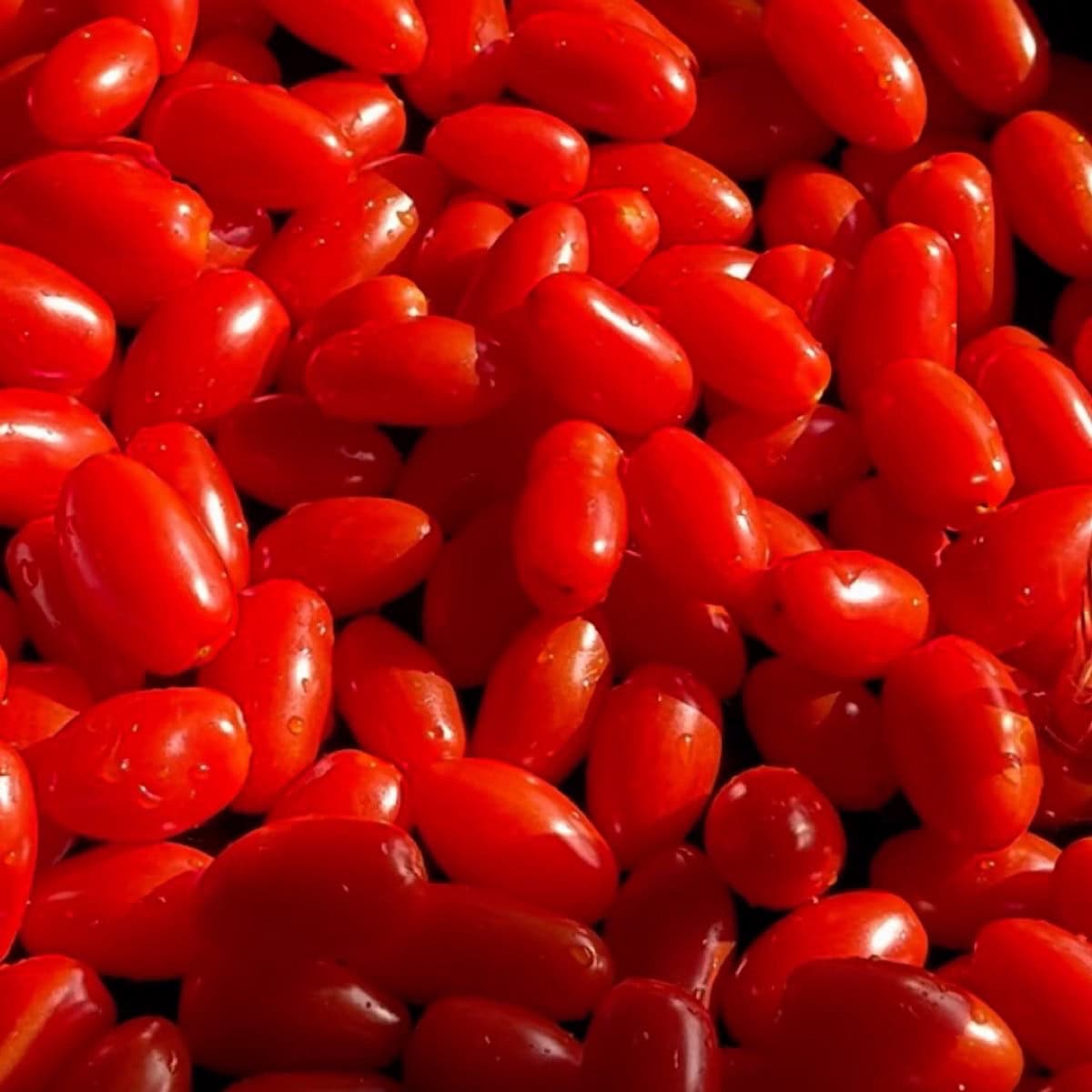 Grape tomatoes in a cold skillet.