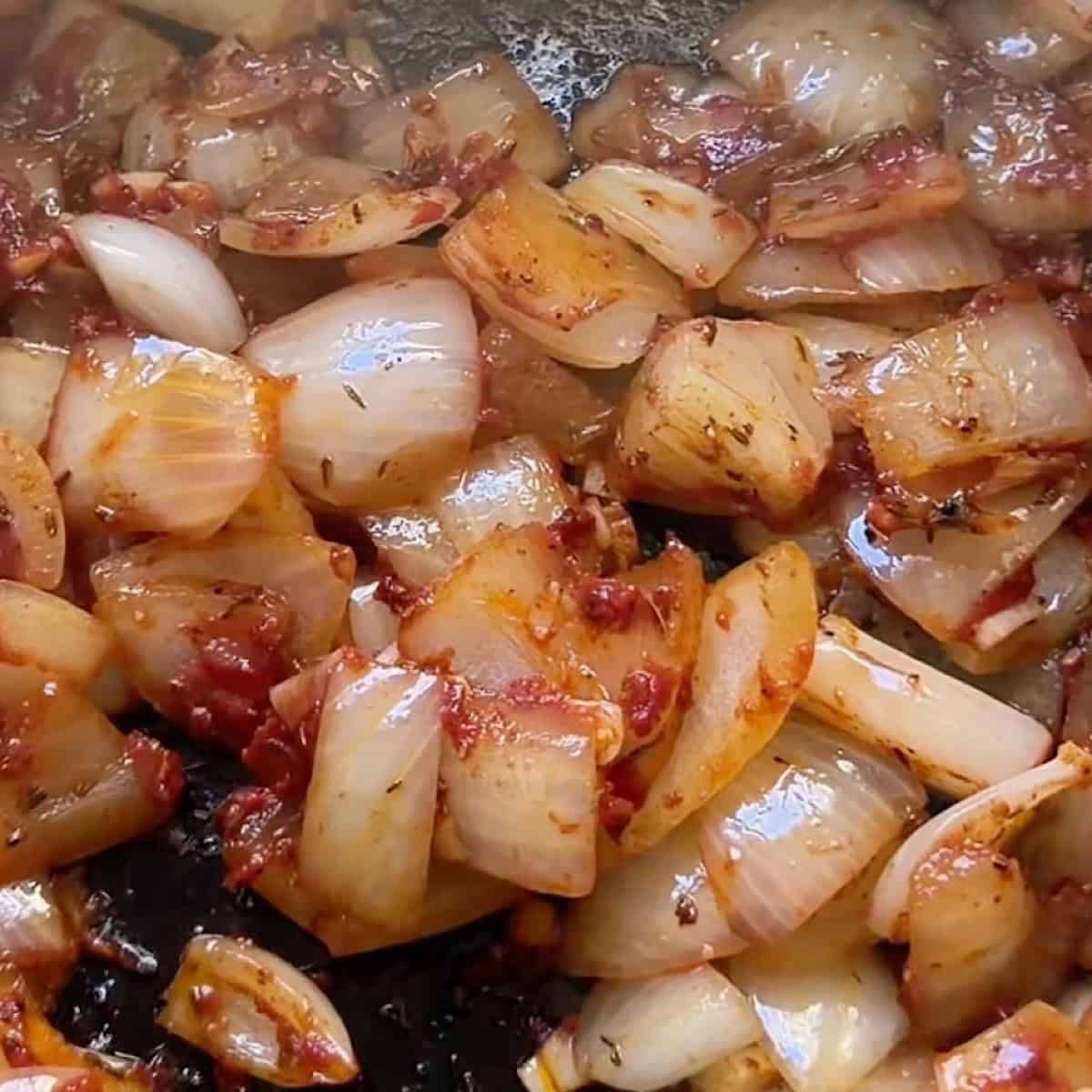 Sauteeing the onion and tomato base.