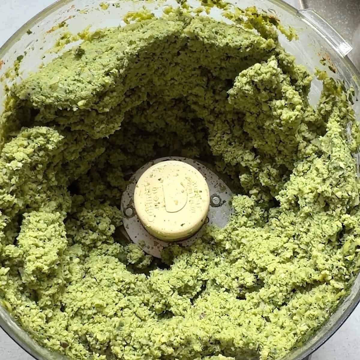 Falafel mixture in food processor pulsed until crumbly.