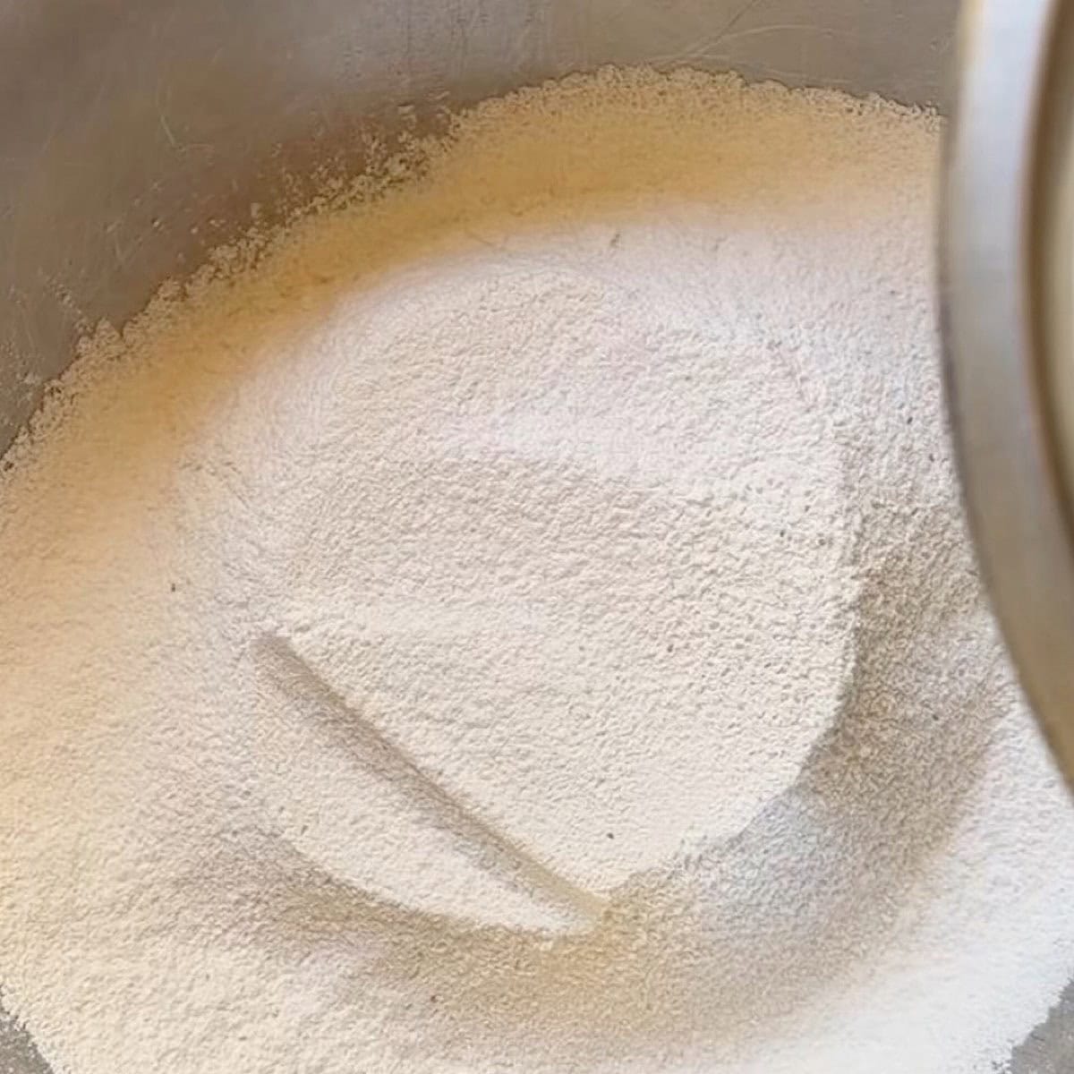 Dry ingredients whisked in a bowl.