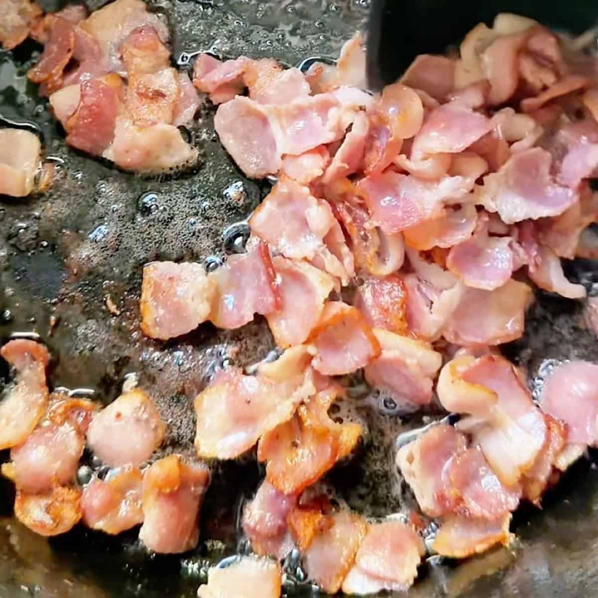 Bacon rendering in a dutch oven.
