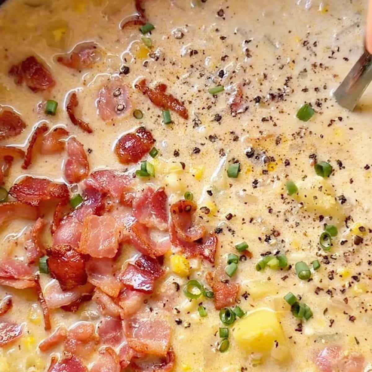 Cream and toppings added to the creamy corn and potato chowder.