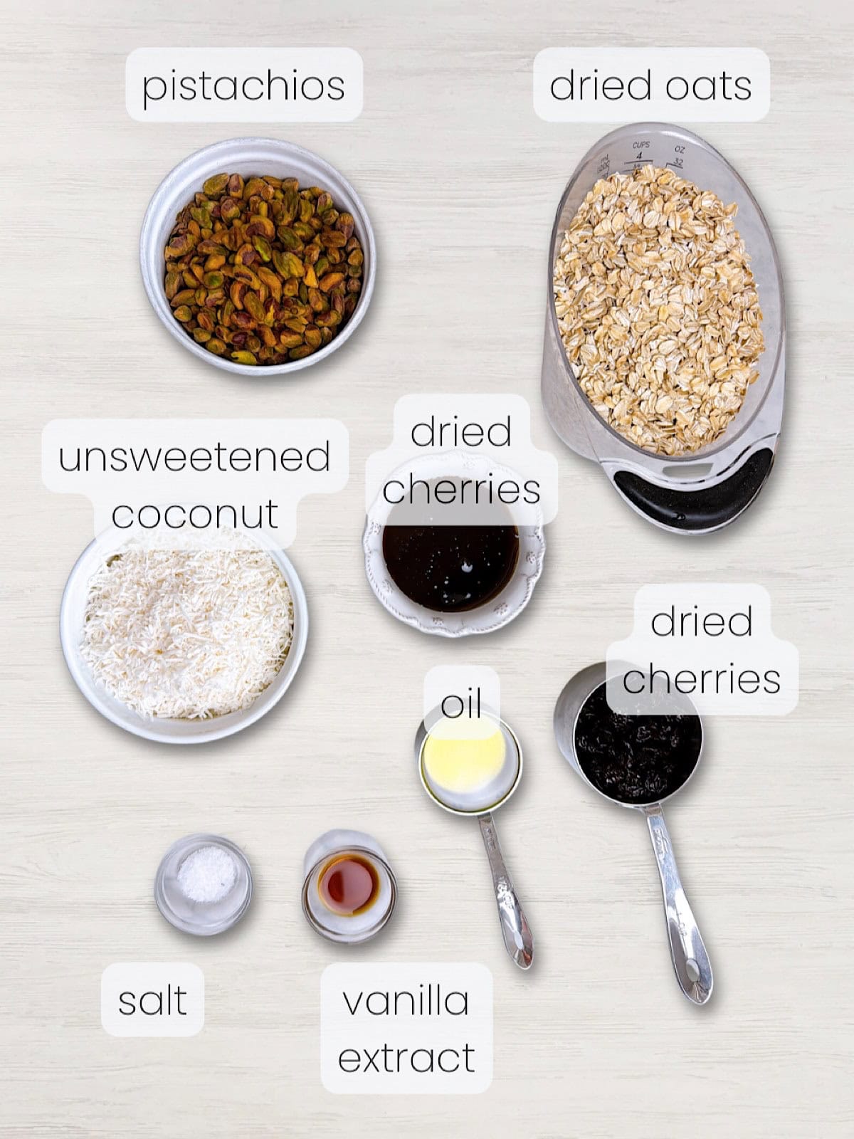 A labeled image of everything needed to make this easy homemade honey granola recipe.