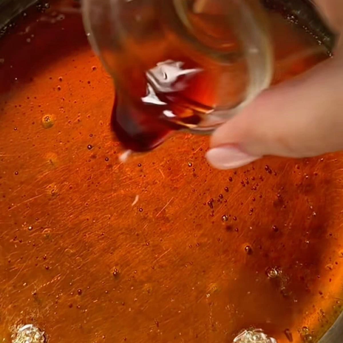 Heating the honey and oil mixture.