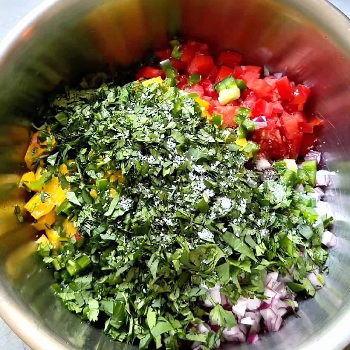 Chopped cilantro added to the mango pico.