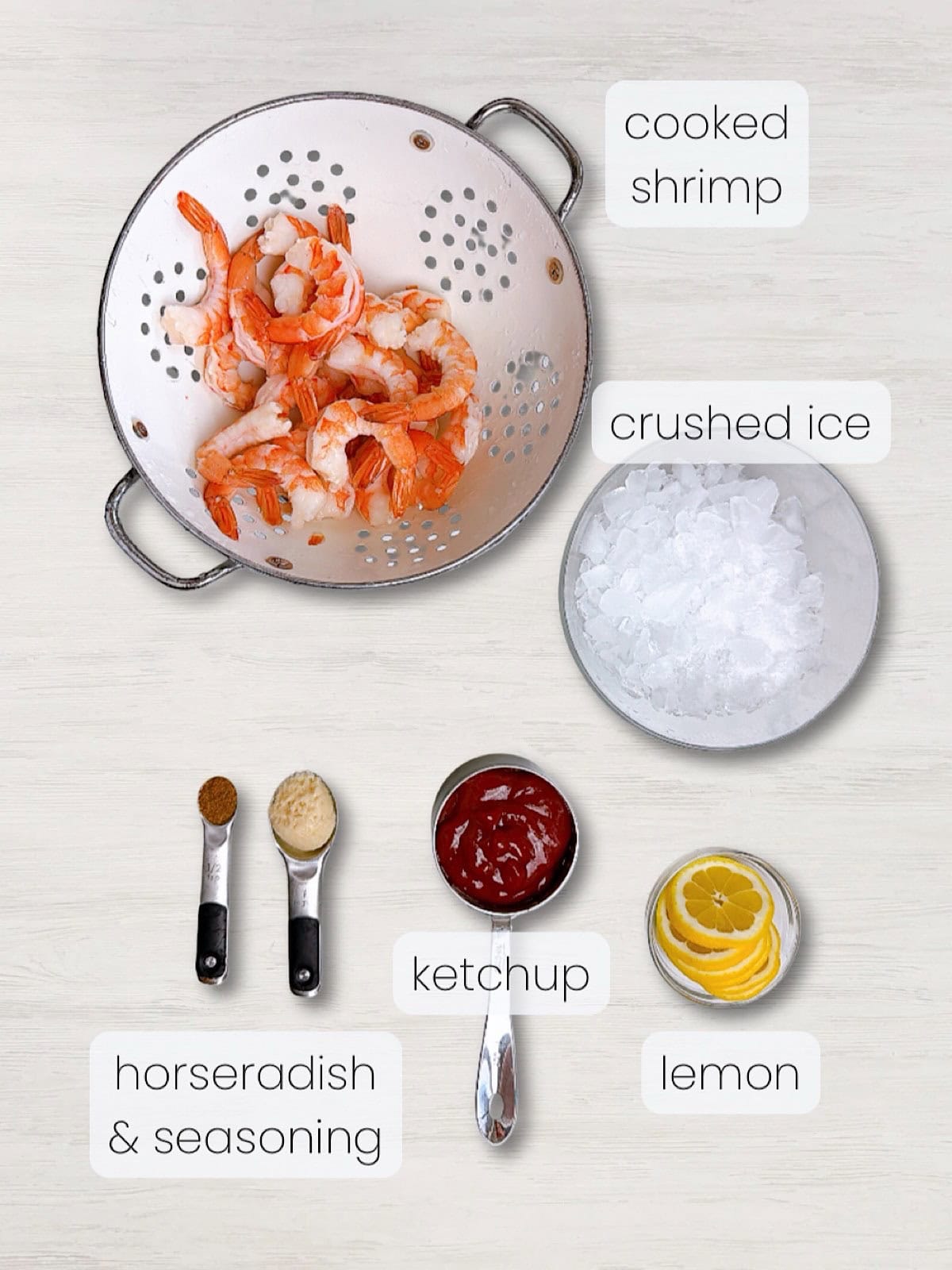 A labeled image of everything needed to make a shrimp cocktail platter.