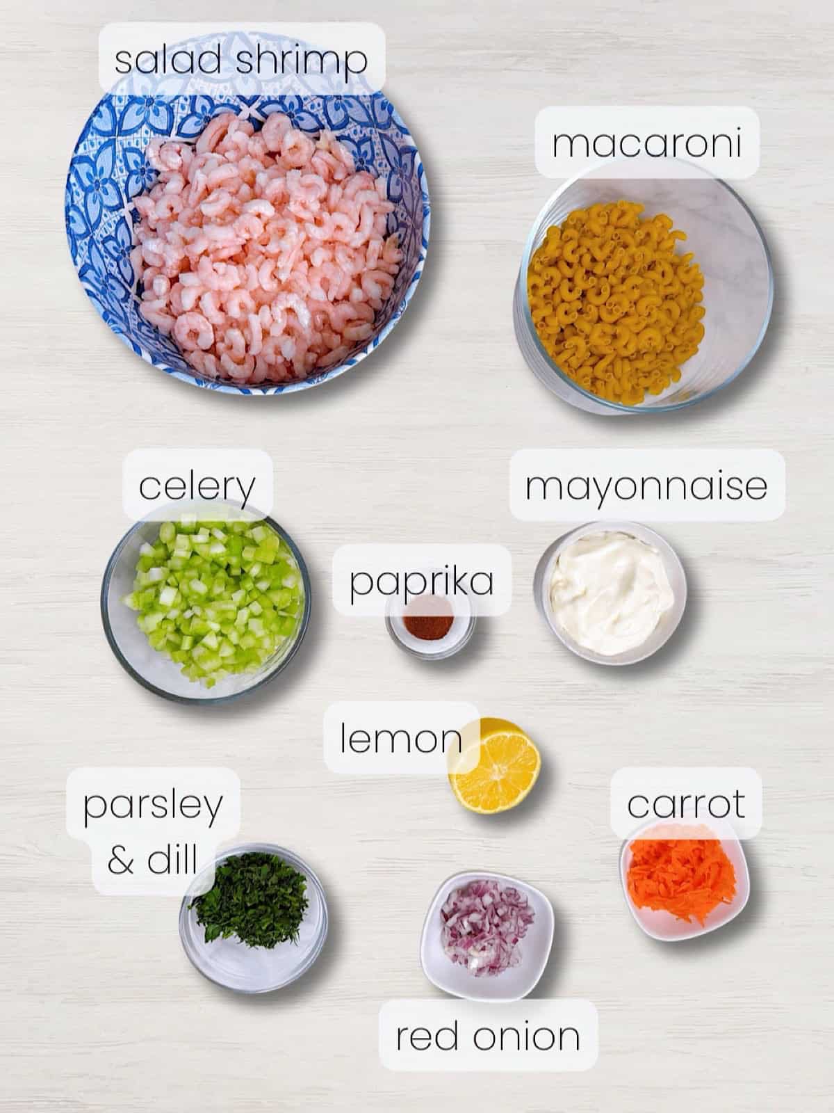 A labeled image of everything needed to make creamy shrimp macaroni salad.