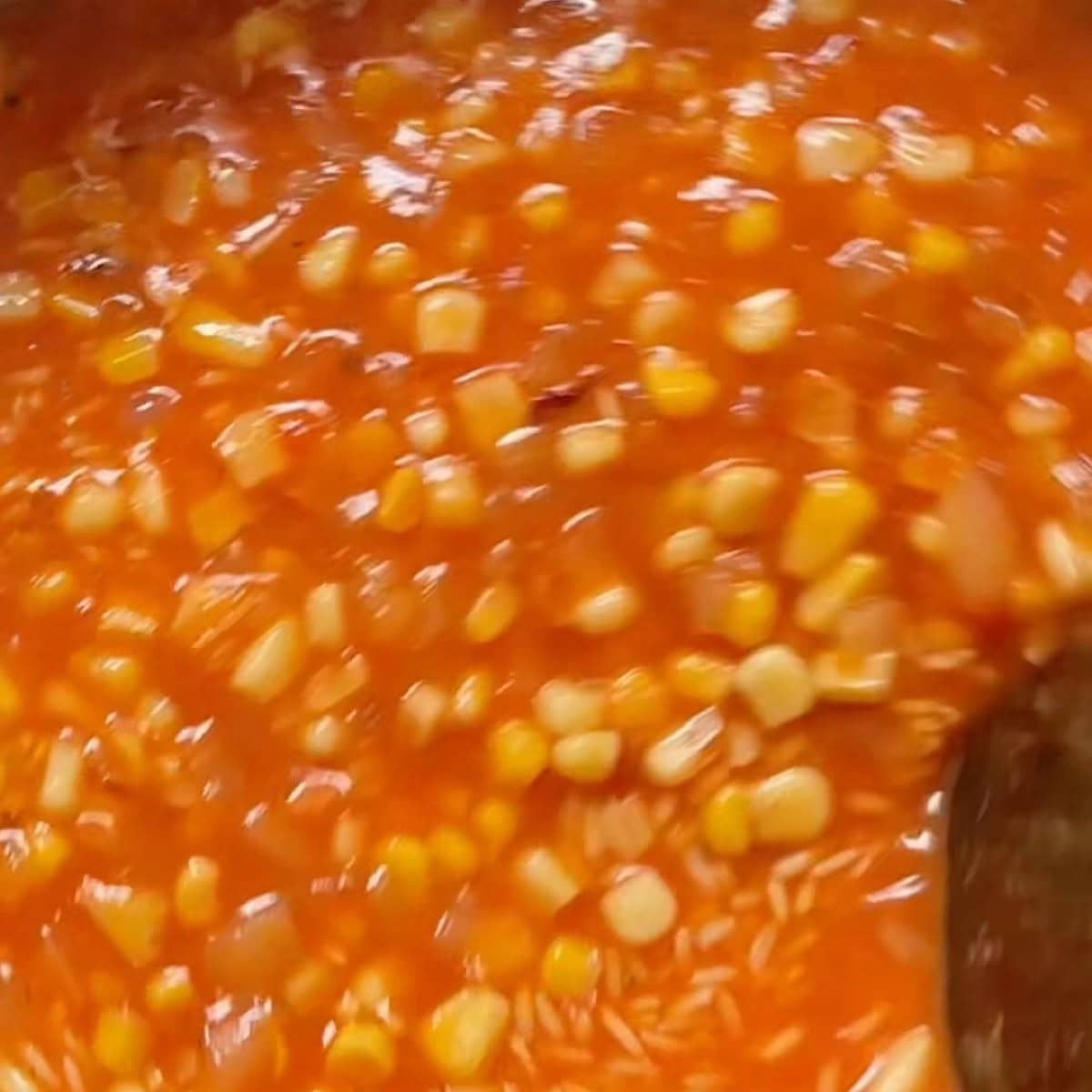 Liquid and seasonings added to the saucepan.