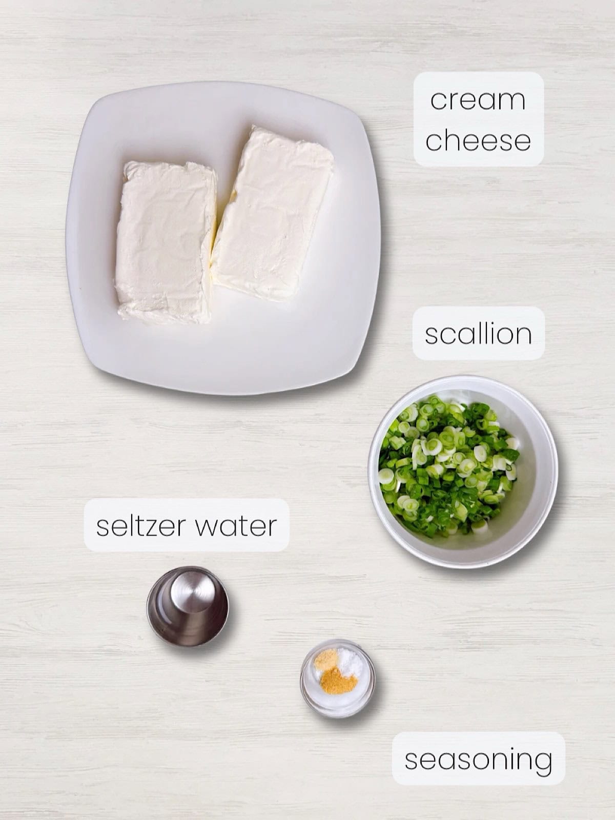 A labeled image of everything needed to make whipped scallion cream cheese.