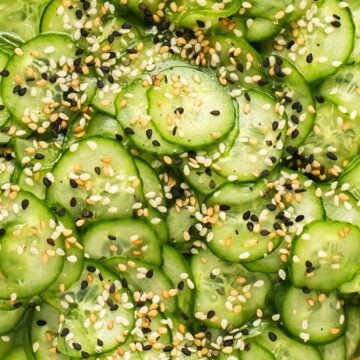 Sunomono salad garnished with sesame seeds.