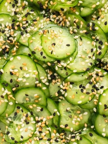 Sunomono salad garnished with sesame seeds.