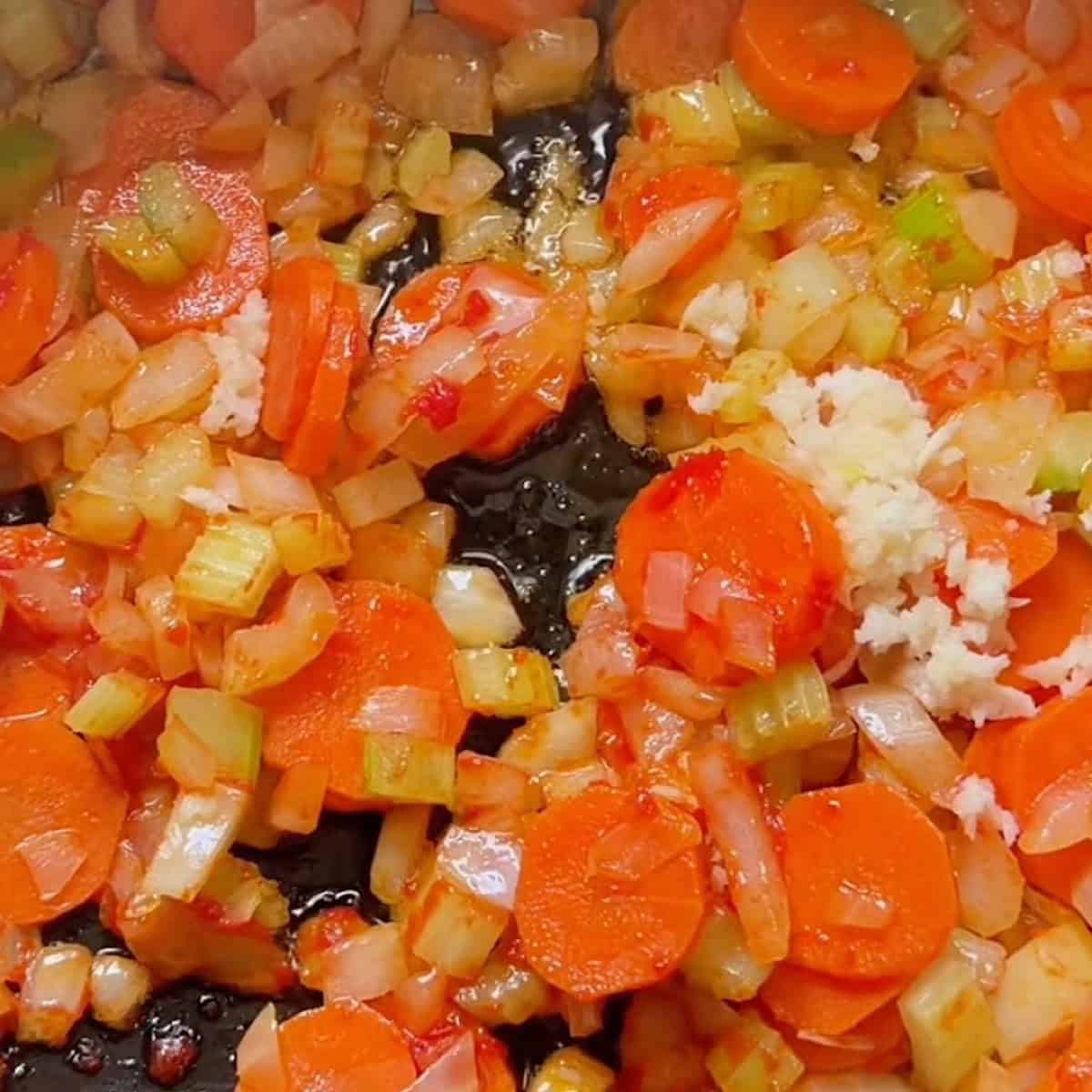 Sauteed vegetables in tomato paste with garlic.