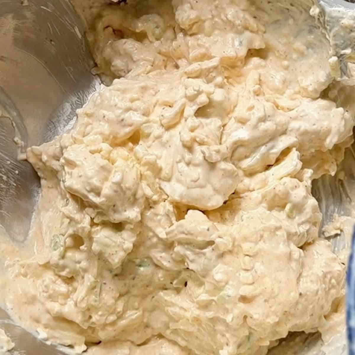 Mixing the creamy base in a mixing bowl.