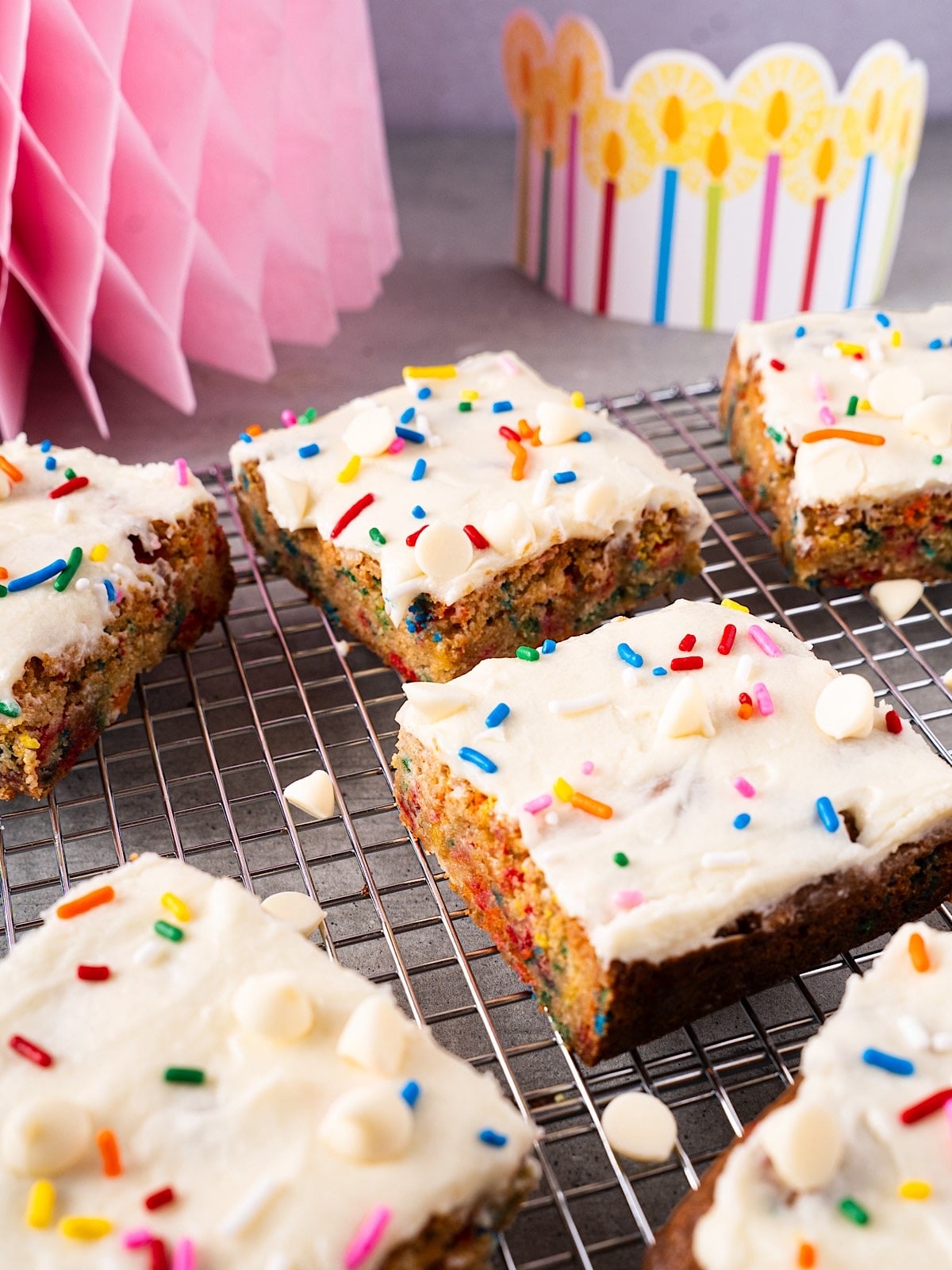 Frosted funfetti blondies with birthday decor.