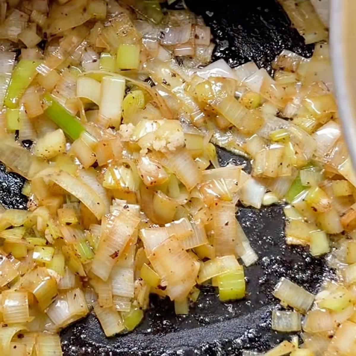 Softening the celery and leeks.