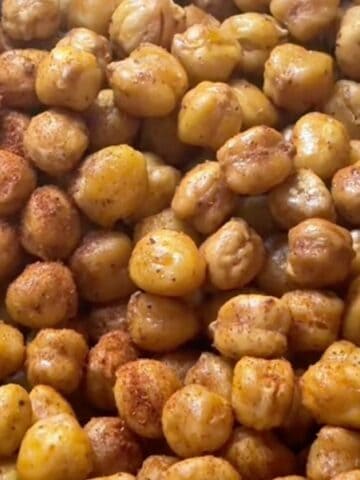 Crispy buffalo chickpeas roasted and dusted with seasoning.