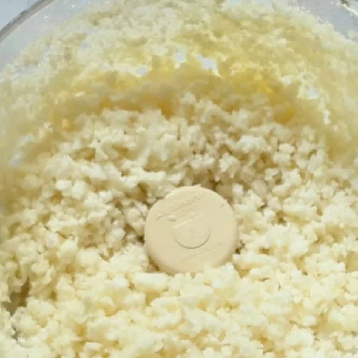 Cauliflower pulsed in a food processor the size of rice.