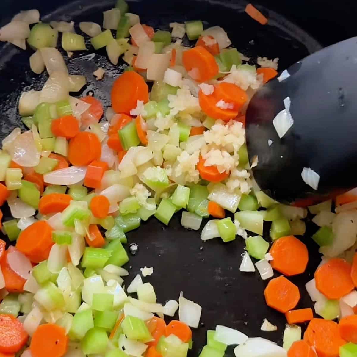Sweating the aromatics with garlic.