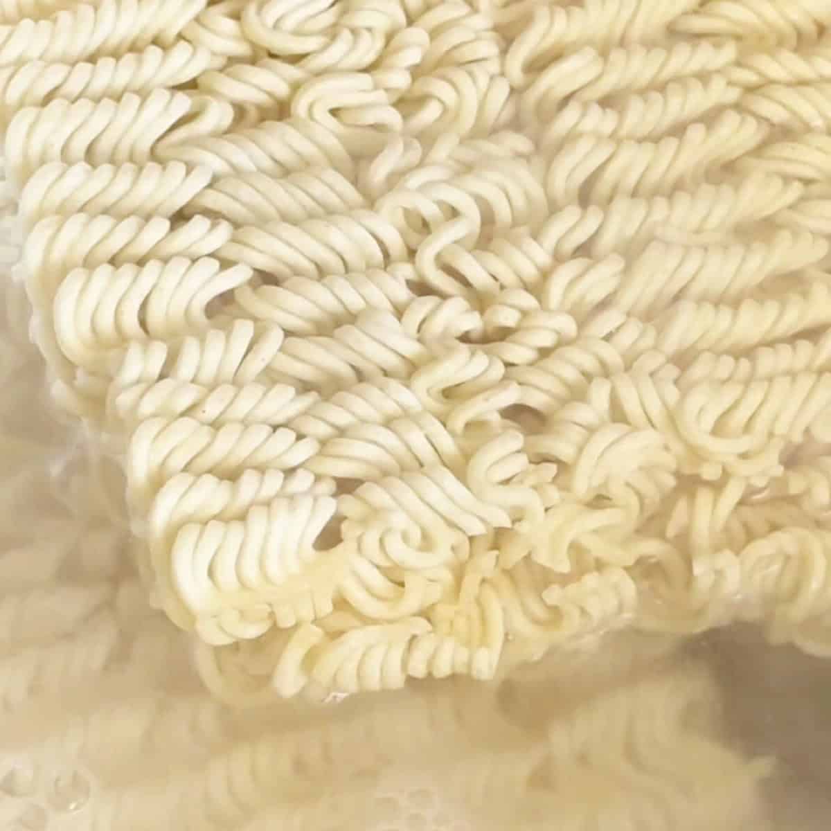 Ramen boiling on the stovetop.