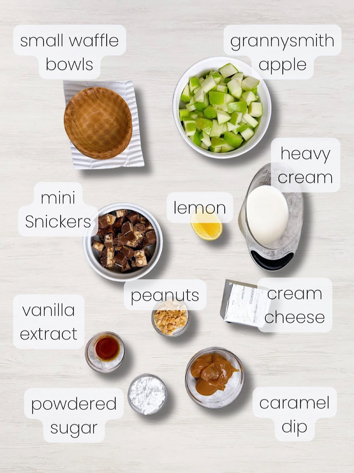 A labeled image of everything needed to make Snickers Caramel Apple Salad Recipe.